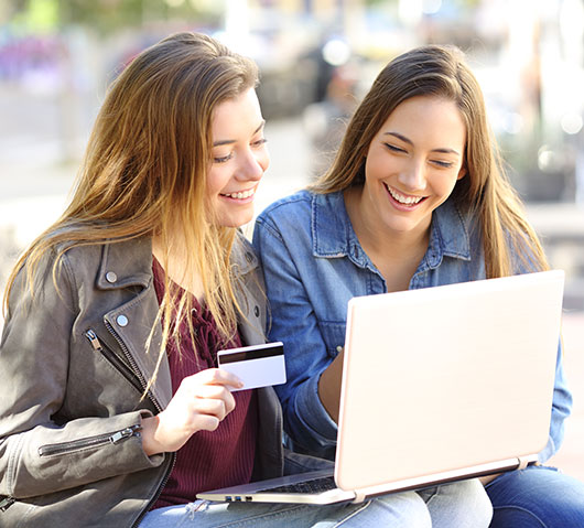 women with laptop and computer